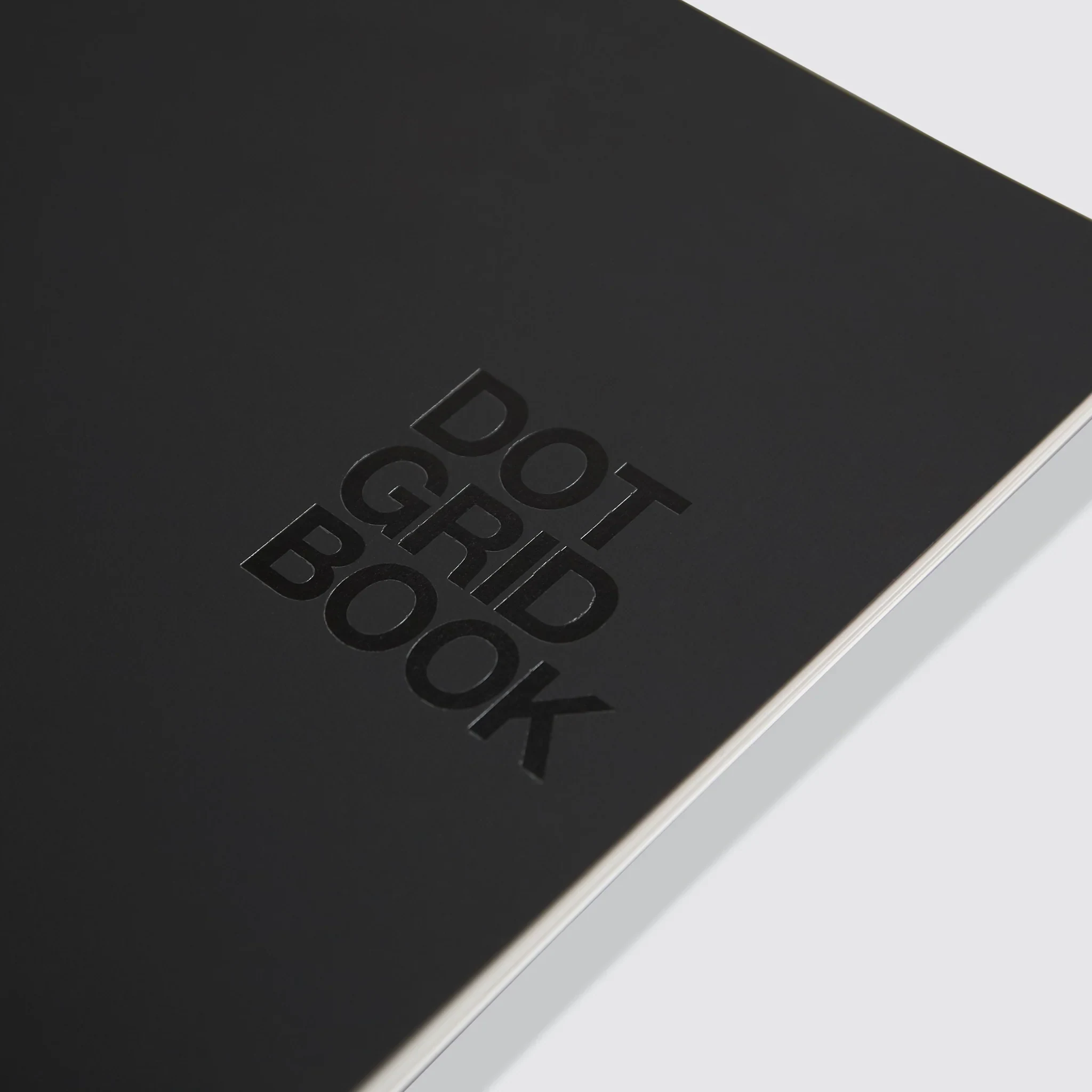 Black Action Method Dot Grid Book with embossed cover lettering